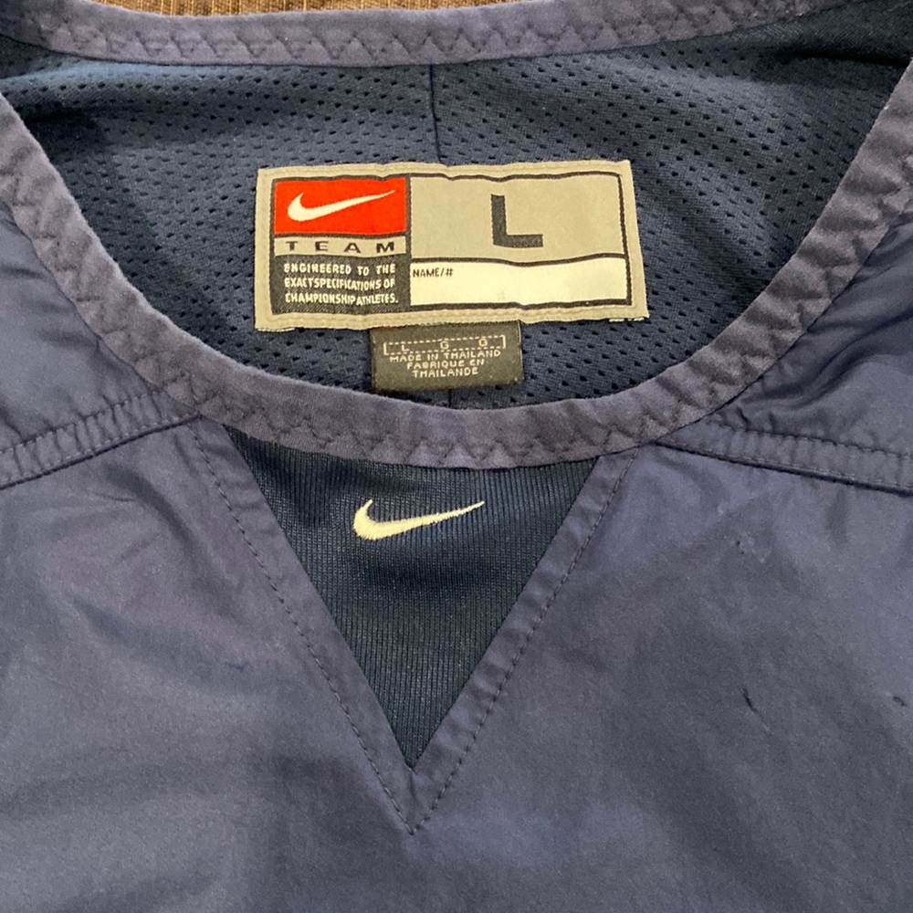 Nike boys baseball game arm up wind breaker.  Nave blue